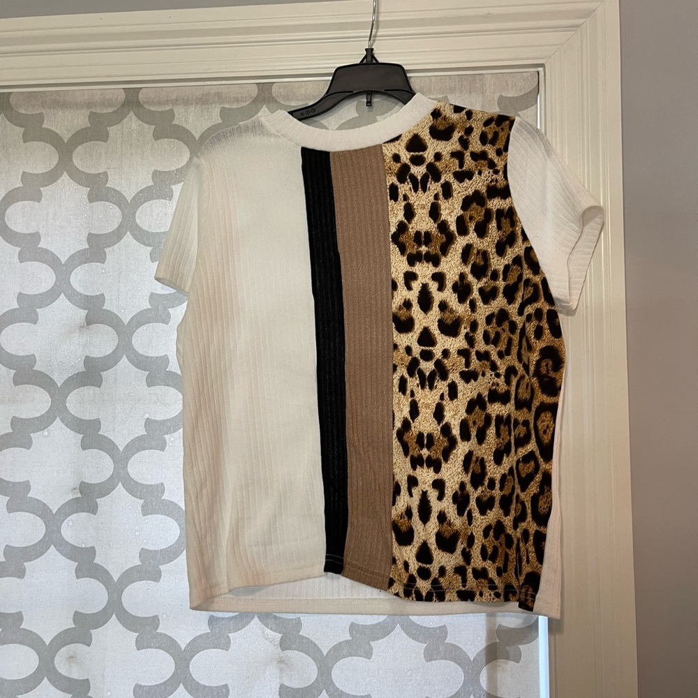 Size medium multi colored shirt never worn